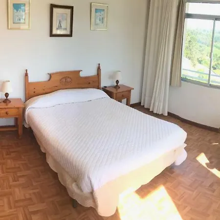 Quarto em Acomodações Particulares Casa Macareno Os Muinos
